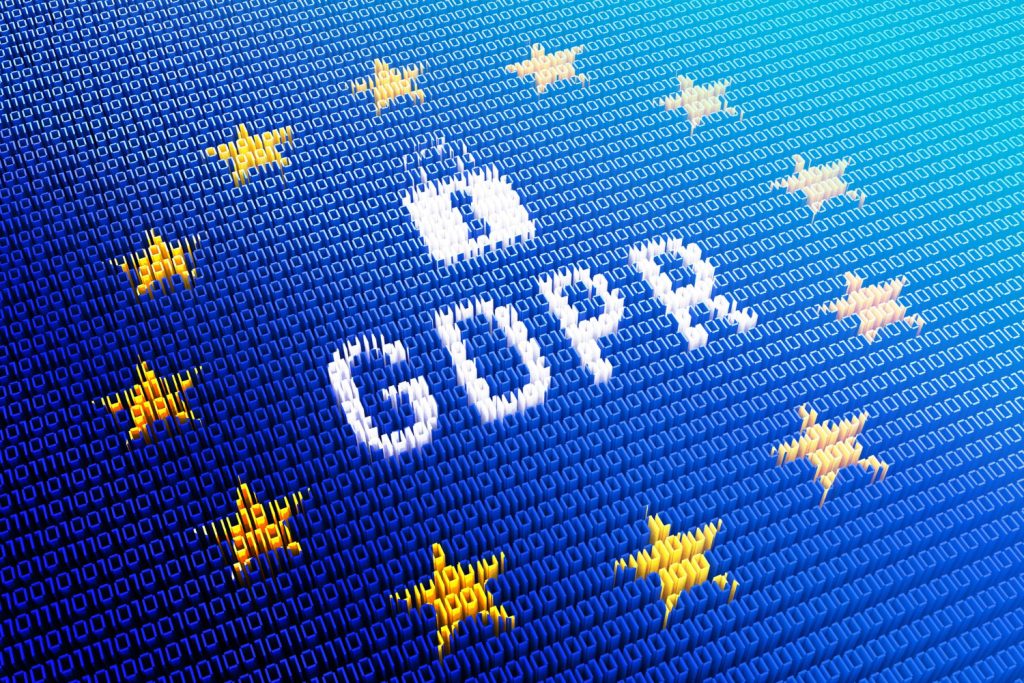 GDPR compliance digital lock surrounded by EU stars on blue background